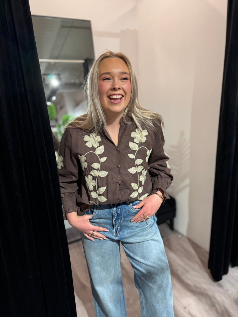 Nora’s shirt brown