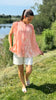 Qnuz ermløs bluse flower orange